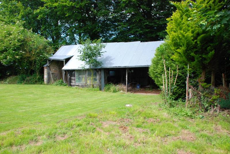 A vendre terrain à bâtir de 1000m² avec bâtiments axe Fécamp / Cany-Barville