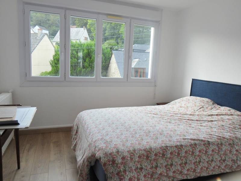 A vendre appartement de 60m² avec 2 chambres, dans une résidence proche des commerces