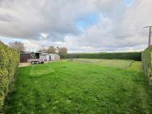 A vendre longère de caractère avec grand terrain et bâtiments proche d'un centre bourg avec école non loin de Goderville